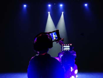 live video coverage into a stage show